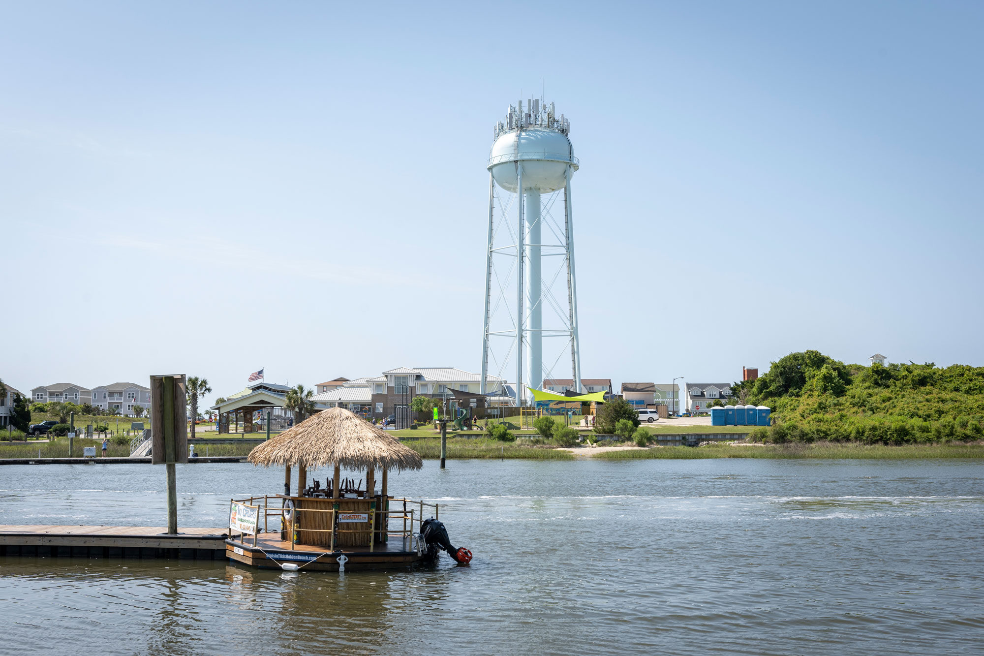 Waterway with water tower in background